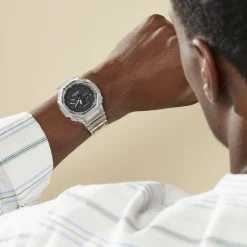 Best CASIO G-SHOCK Montre Noir cadran gris fond noir bracelet résine blanche