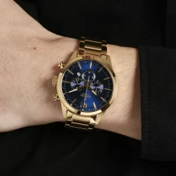 FESTINA Montre Timeless Chronograph Bleu cadran doré fond bleu bracelet acier doré
